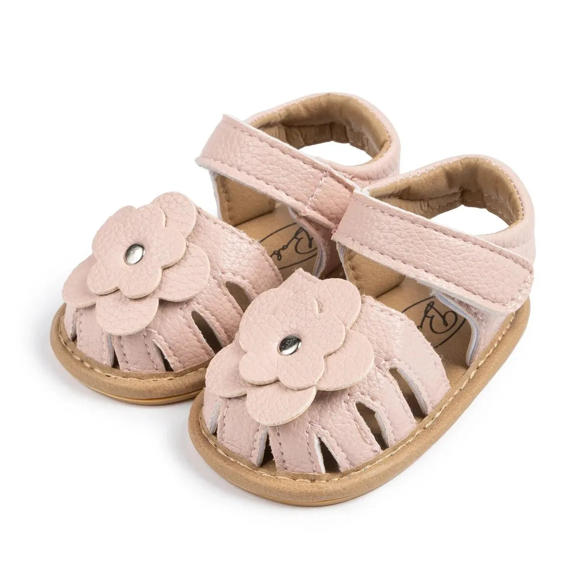 Light pink soft sole baby girl sandals featuring 3D floral applique and breathable cutout design.
