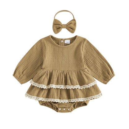 Mustard brown vintage-inspired infant girl puff sleeve romper dress with lace trim and matching bow headband on a white background.