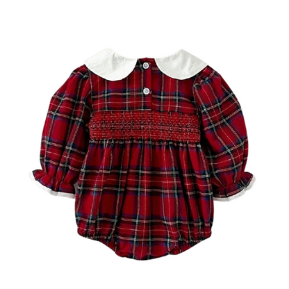Back view of baby girl long sleeve red plaid Christmas romper with white Peter Pan collar