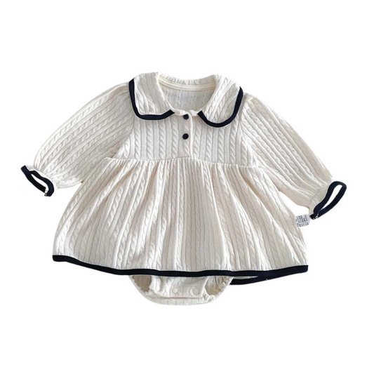 Ivory baby girl long sleeve cable knit romper dress with contrasting black Peter Pan collar and tri