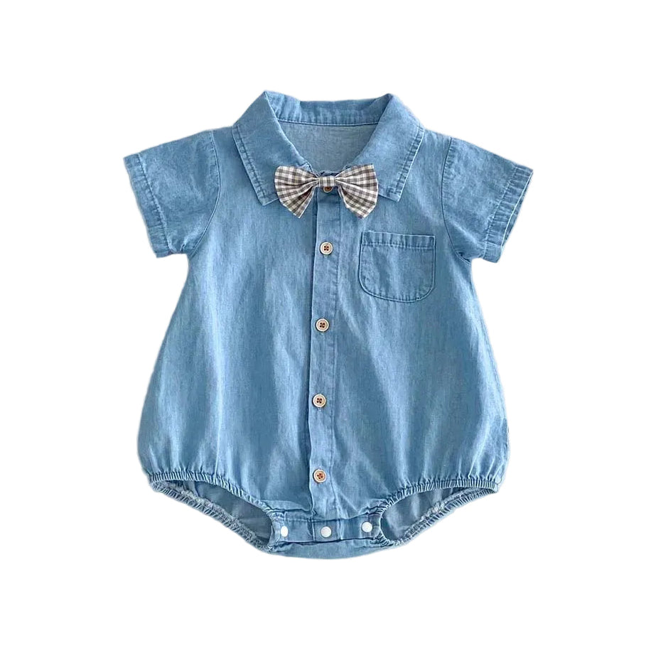 Flat lay of the light blue denim-style baby boy romper with button-down front and bow tie.