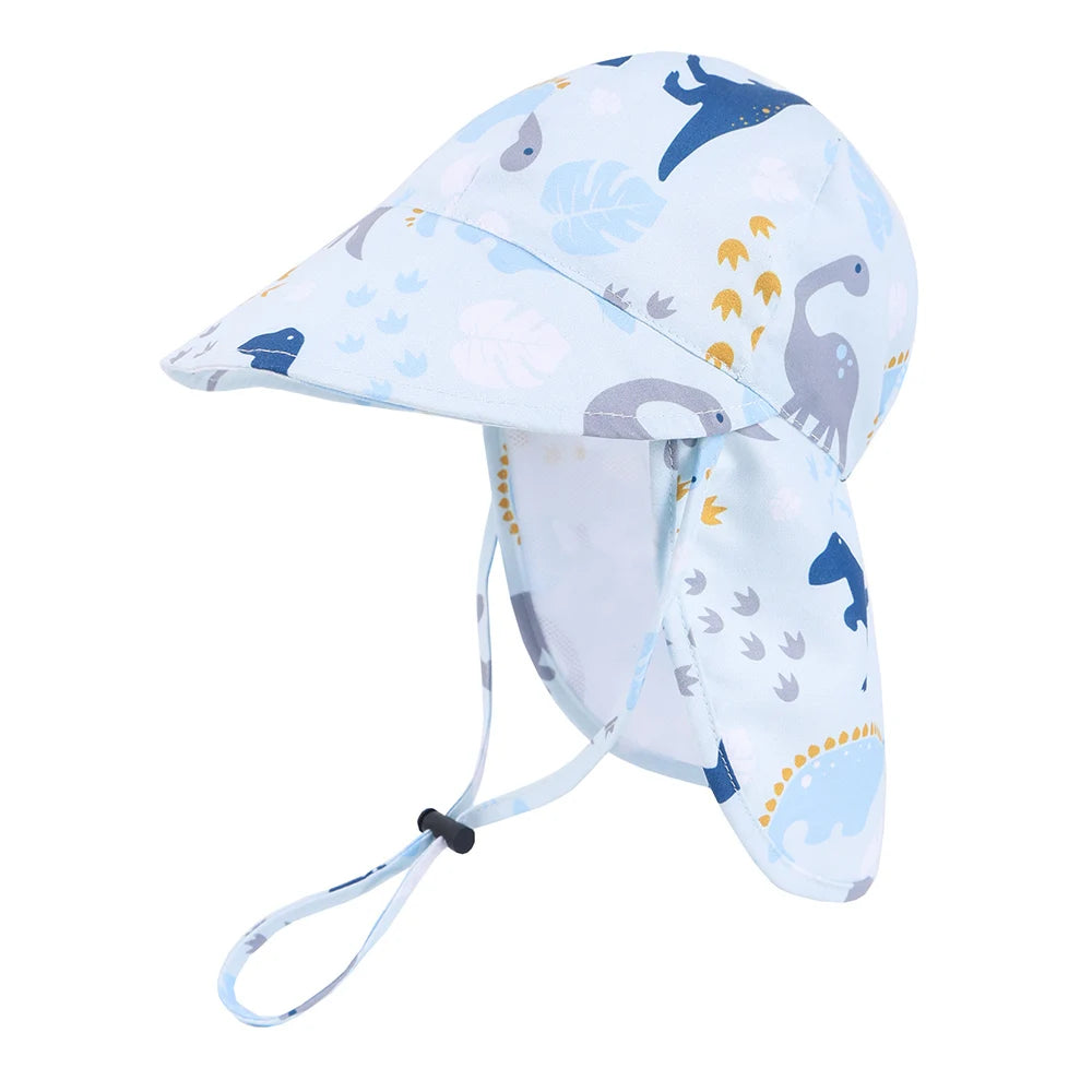 Light blue dinosaur print toddler sun hat with neck flap and adjustable chin strap on a white background.