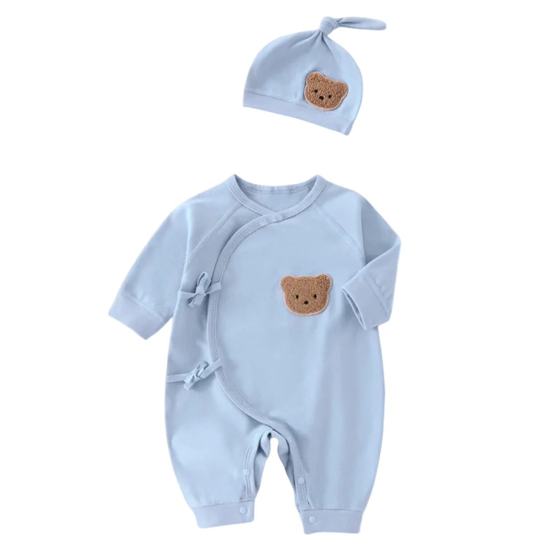 Light blue newborn side-snap jumpsuit and matching knotted beanie set with a cute bear face patch.