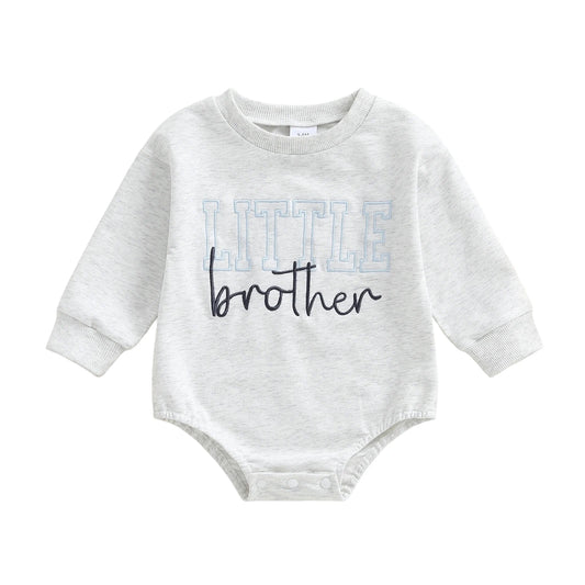 Light grey long-sleeve baby boy bubble romper featuring a blue and navy Little Brother graphic on a white background.