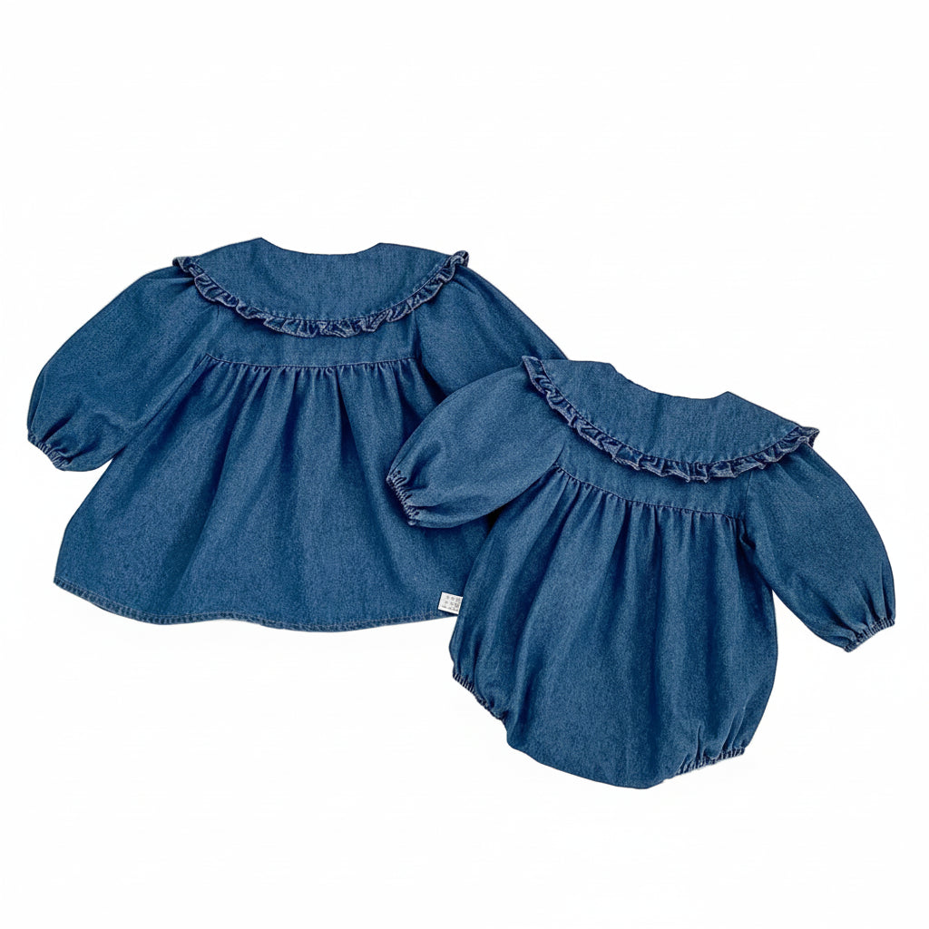 Baby girl denim romper and matching toddler sister dress displayed together, ideal for coordinating sibling looks.