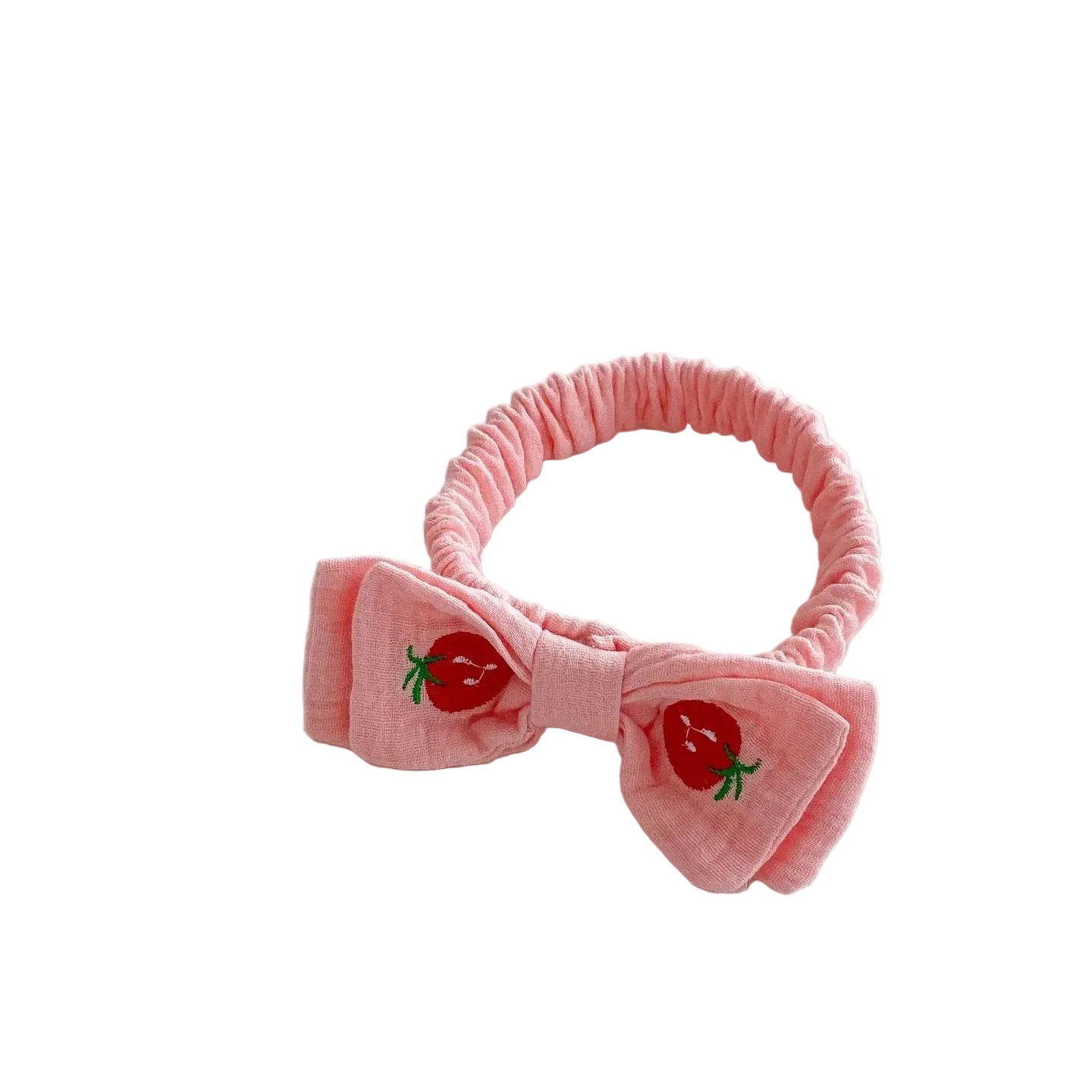 The matching strawberry pink elasticated baby headband with a structured fabric bow featuring a small embroidered red strawberry.