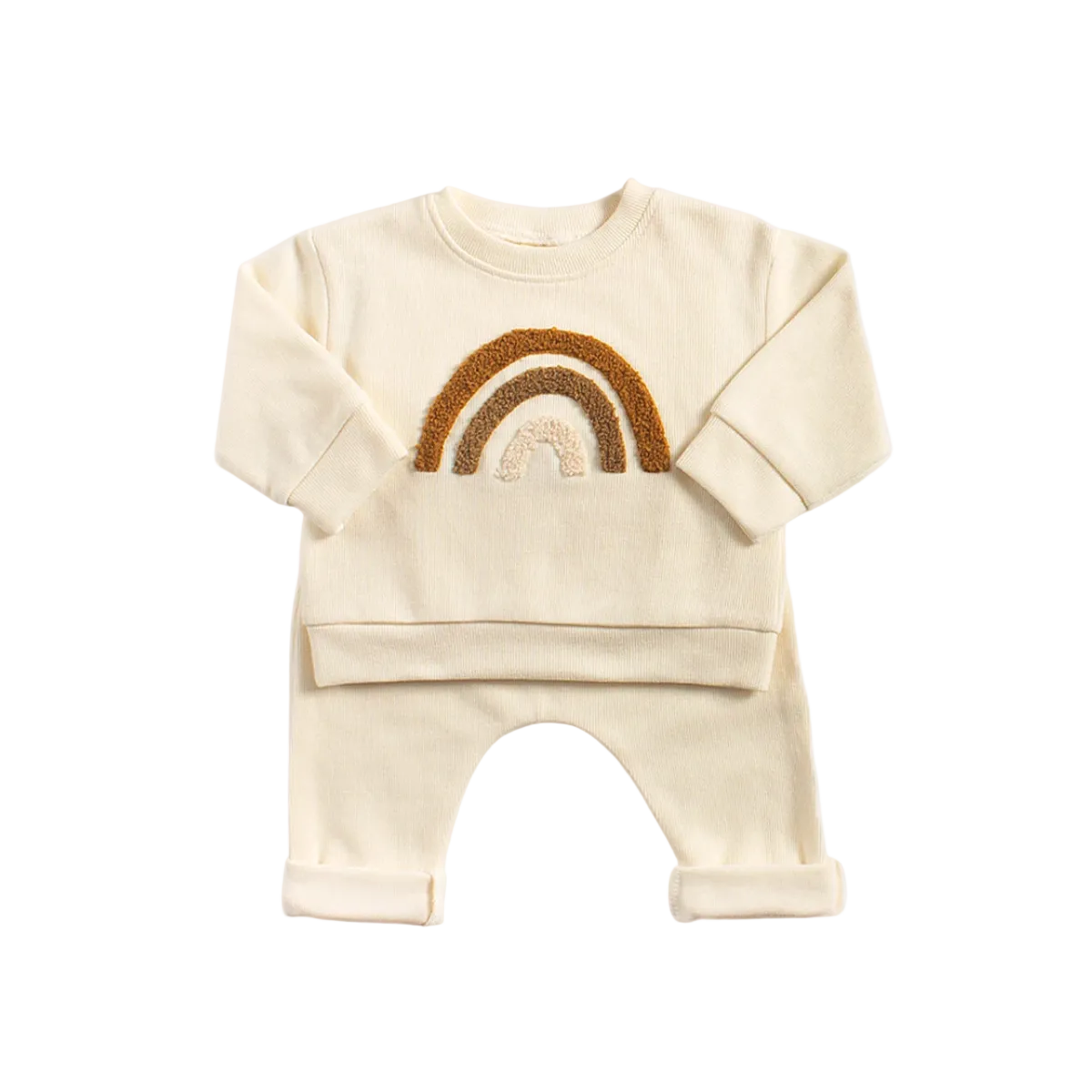Cream baby pullover sweatshirt featuring a textured earth-tone rainbow design with matching knit leggings hanging on a wooden rack.