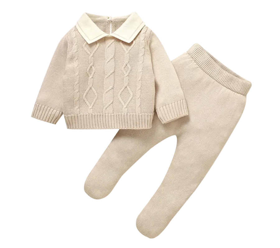 2-piece newborn boy cable knit sweater and footed pants set in soft beige.