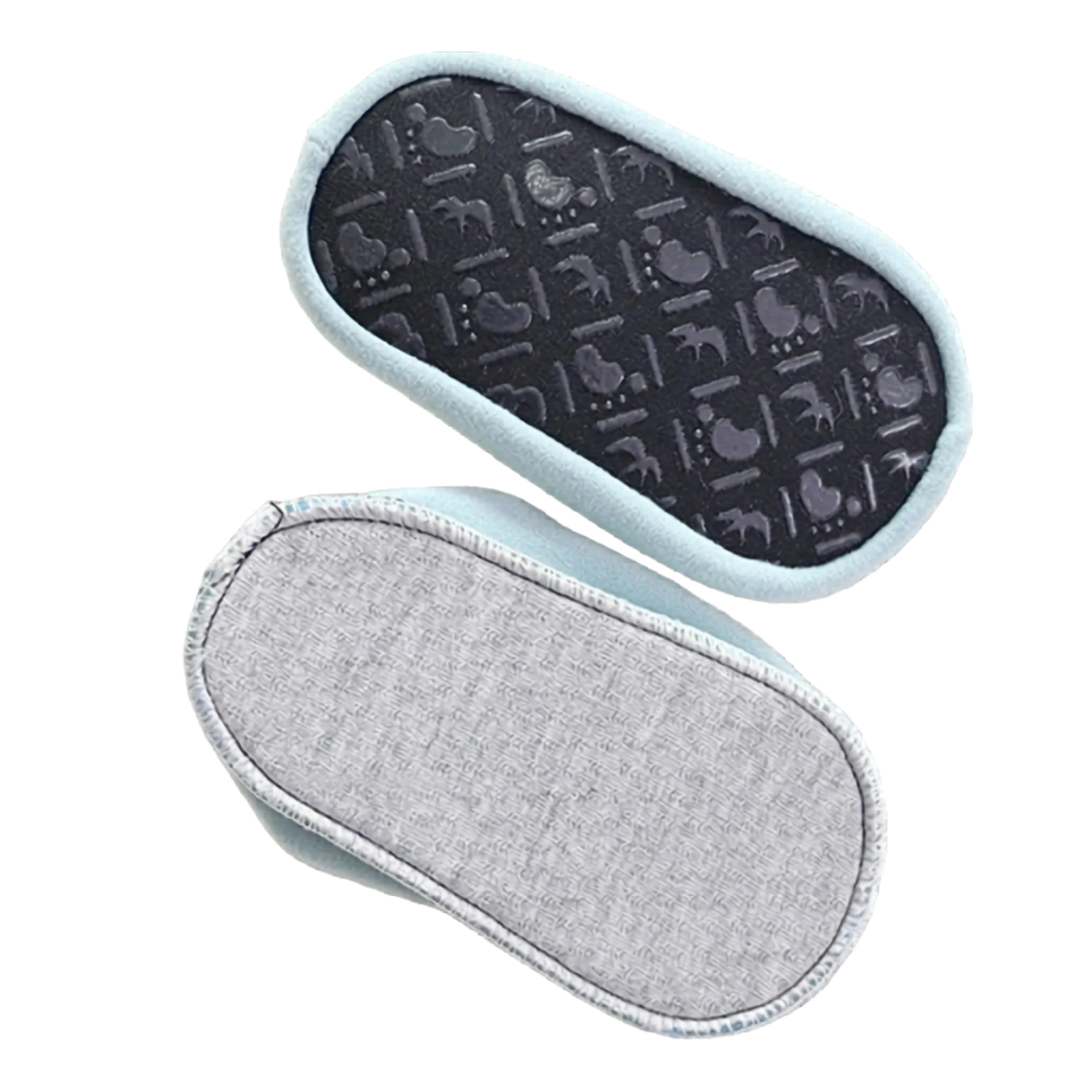 Top and bottom view of Kidsely water shoes showing the textured non-slip rubber outer sole and the comfortable gray inner lining.