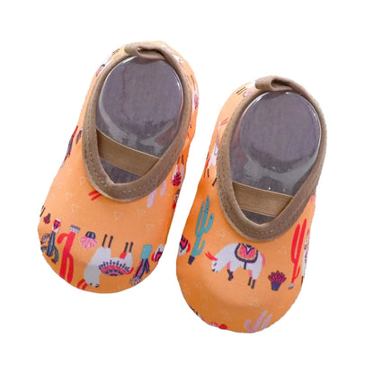 Kidsely orange barefoot water shoes with llama and cactus pattern for toddlers.