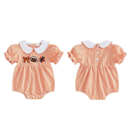 Side-by-side view showing the front and back of the orange and white striped baby girl football romper, highlighting the back button closure and ruffle details.
