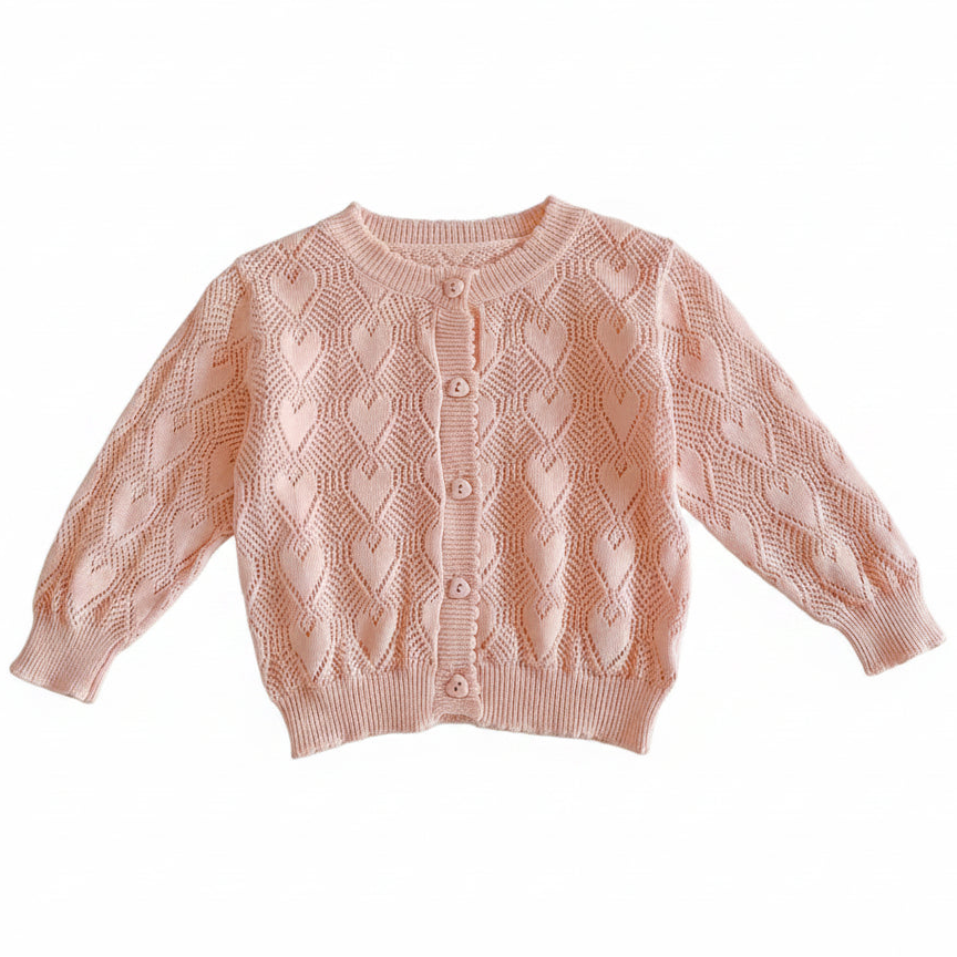 Full view of the pink baby girl cotton knit pointelle heart cardigan sweater laid flat against a white background.