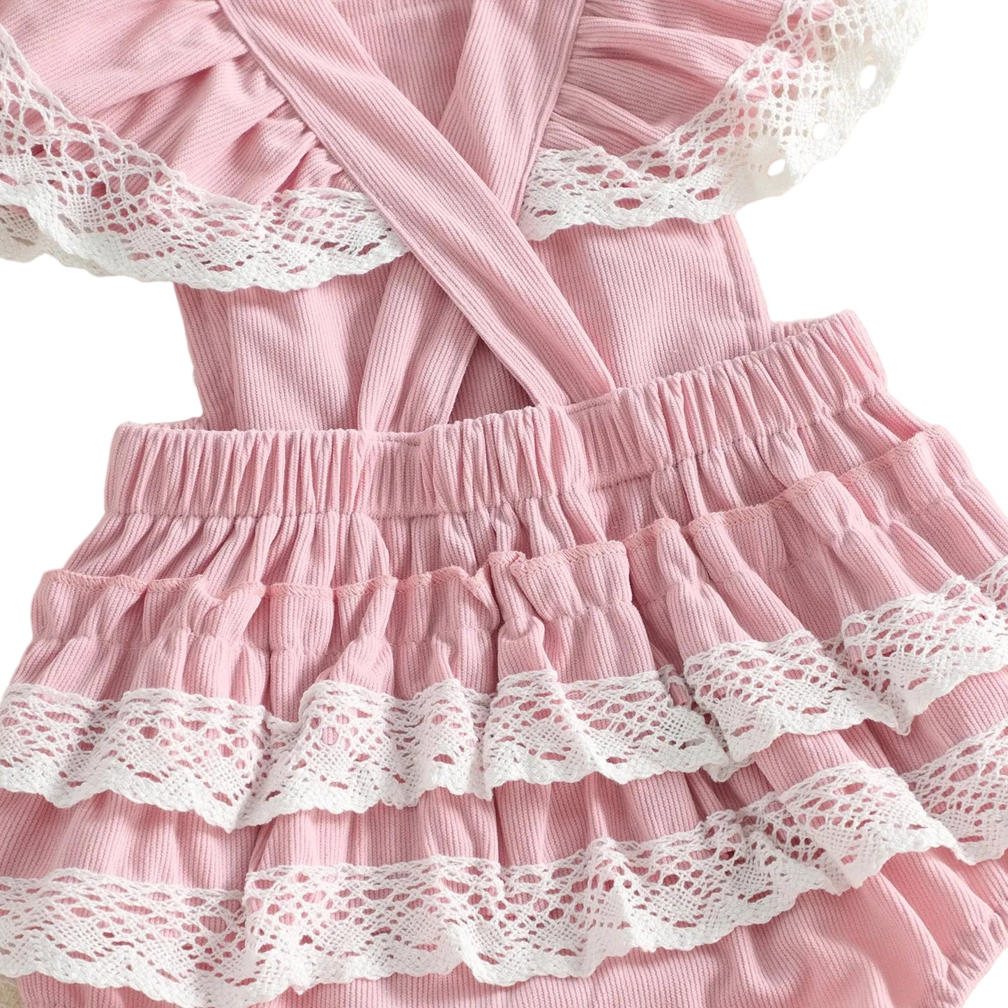 Close-up of the back of the pink 6-month baby girl romper showing the cross-back straps and cute lace trim ruffle butt design.