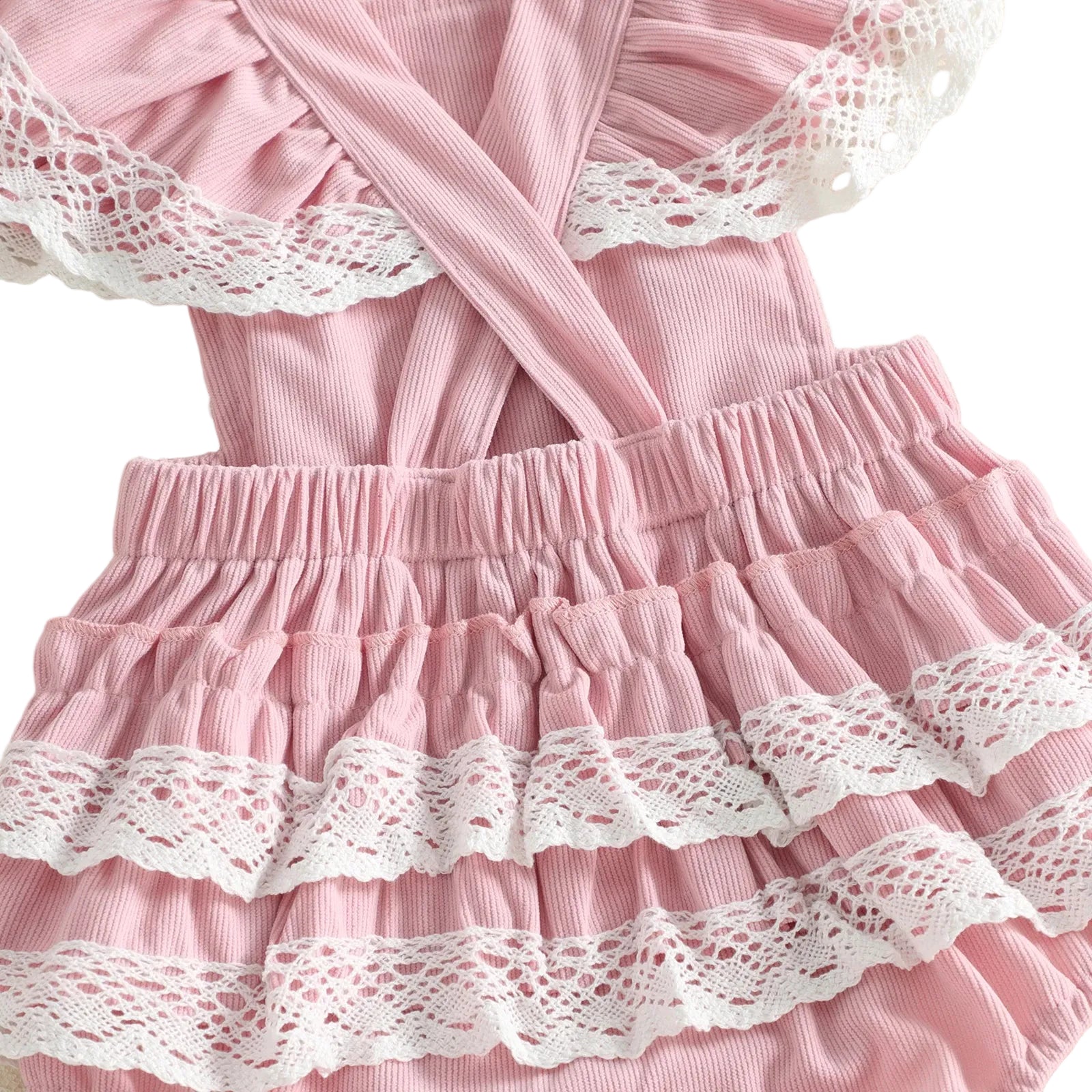 Close-up of the back of the pink 6-month baby girl romper showing the cross-back straps and cute lace trim ruffle butt design.