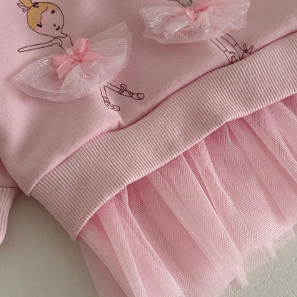 Detailed view of the layered pink tulle ruffle trim at the bottom hem of the baby girl sweatshirt.