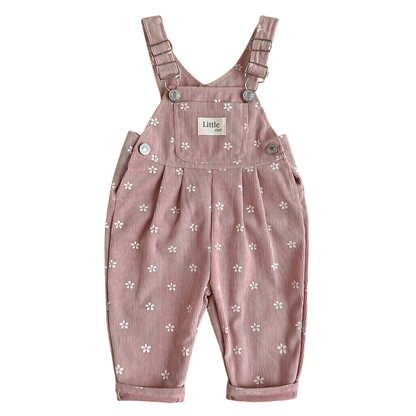 Front view of baby and toddler girl pink floral corduroy overalls featuring a front pocket and metal buckles on a white background.