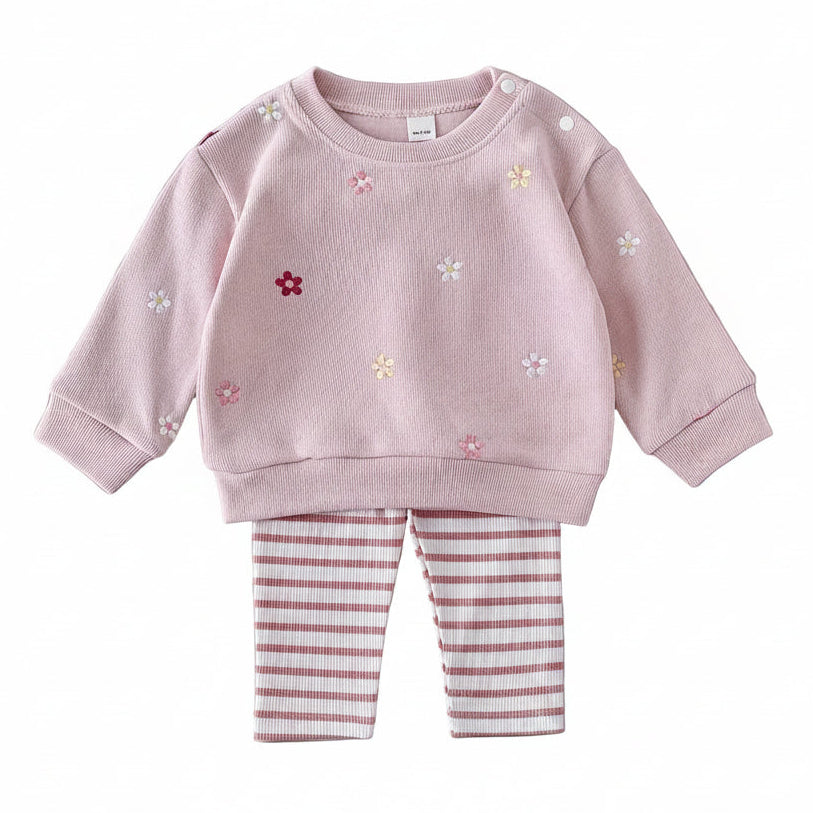 Baby girl's dusty pink long-sleeve pullover sweatshirt with floral embroidery paired with pink and white striped leggings.