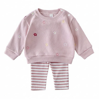 Baby girl's dusty pink long-sleeve pullover sweatshirt with floral embroidery paired with pink and white striped leggings.