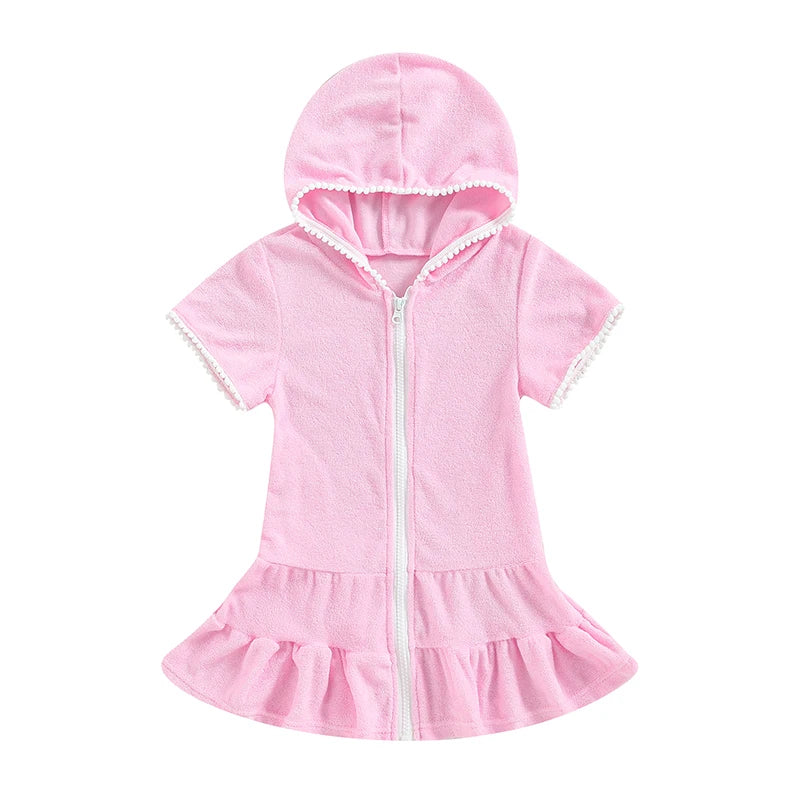 Soft pink hooded swim cover-up for girls with white zipper and ruffle skirt detail.