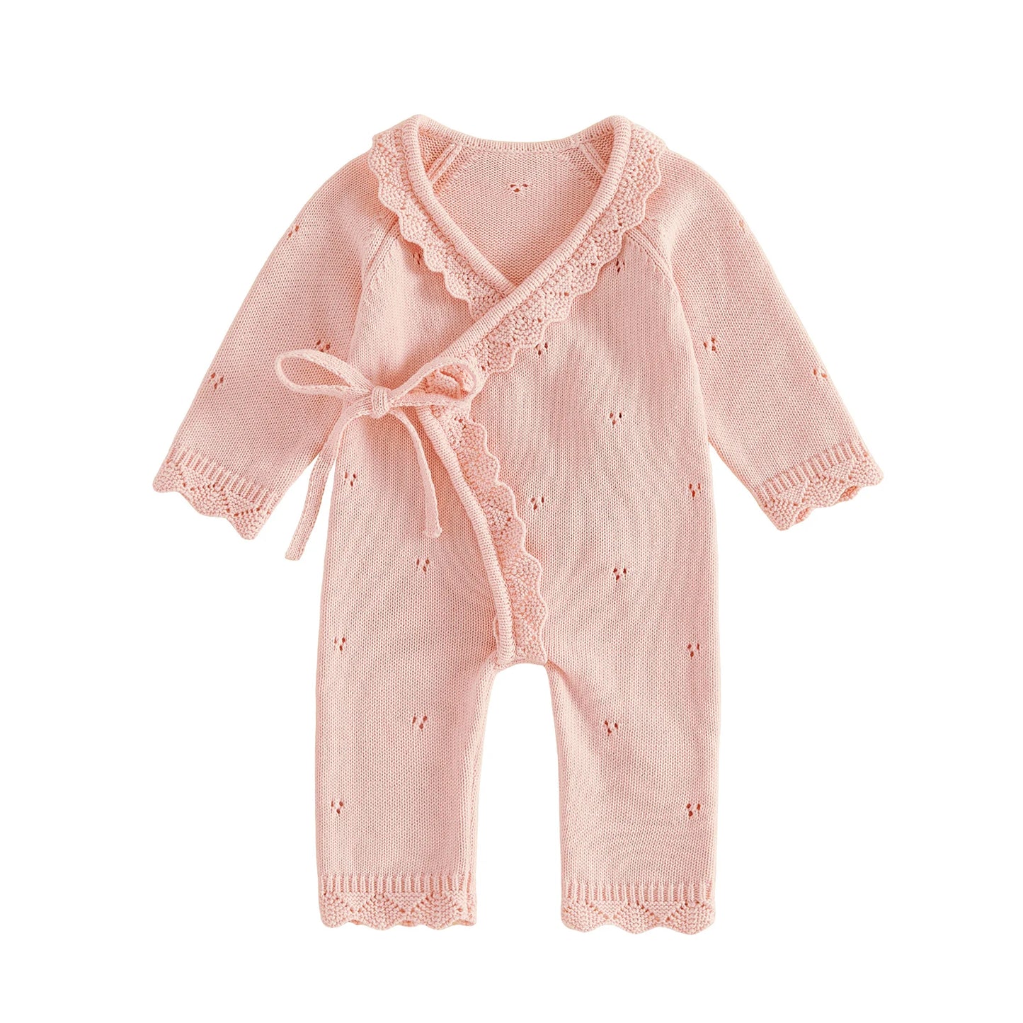 Pink pointelle knit baby girl kimono romper with scalloped trim and side tie on a white background.