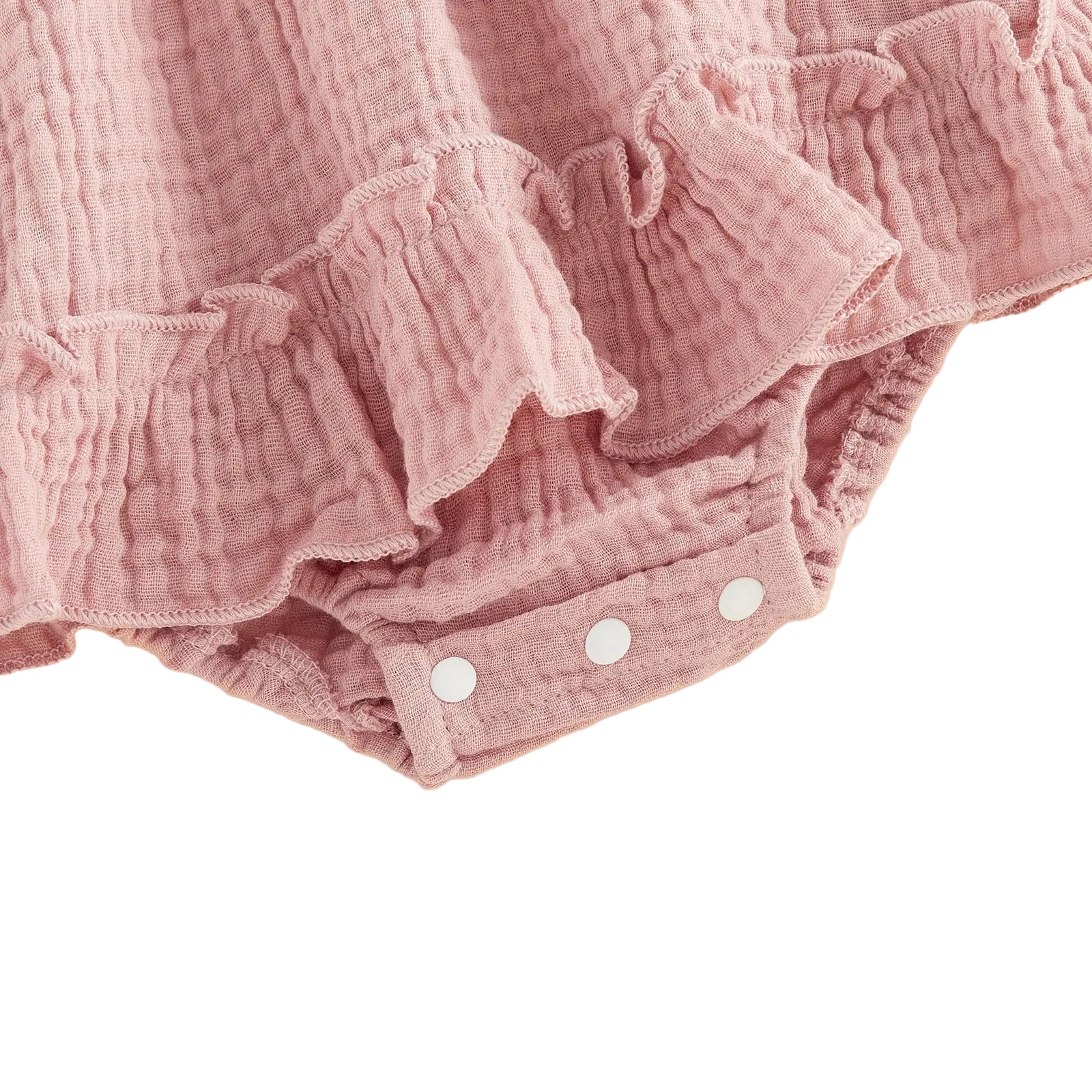 Close-up showing the convenient bottom snap closure and delicate ruffled leg trim on the pink strawberry baby romper.