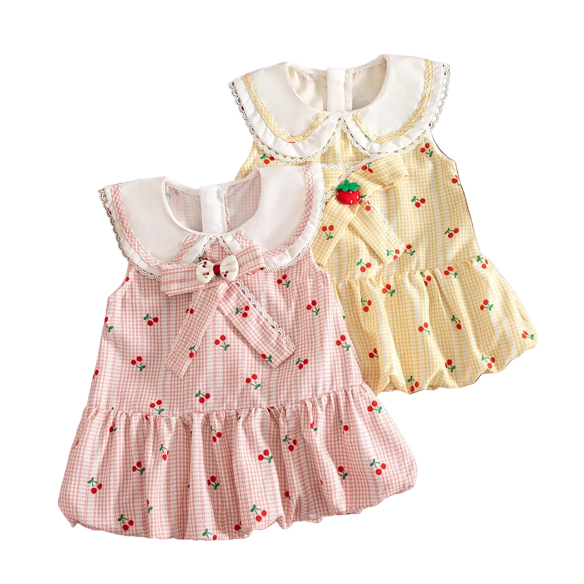 Two sleeveless baby girl bubble dresses in pink and yellow cherry gingham patterns laid side by side.