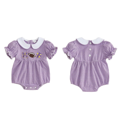 Side-by-side view showing the front and back of the purple and white striped baby girl football romper, highlighting the back button closure and ruffle sleeve details.