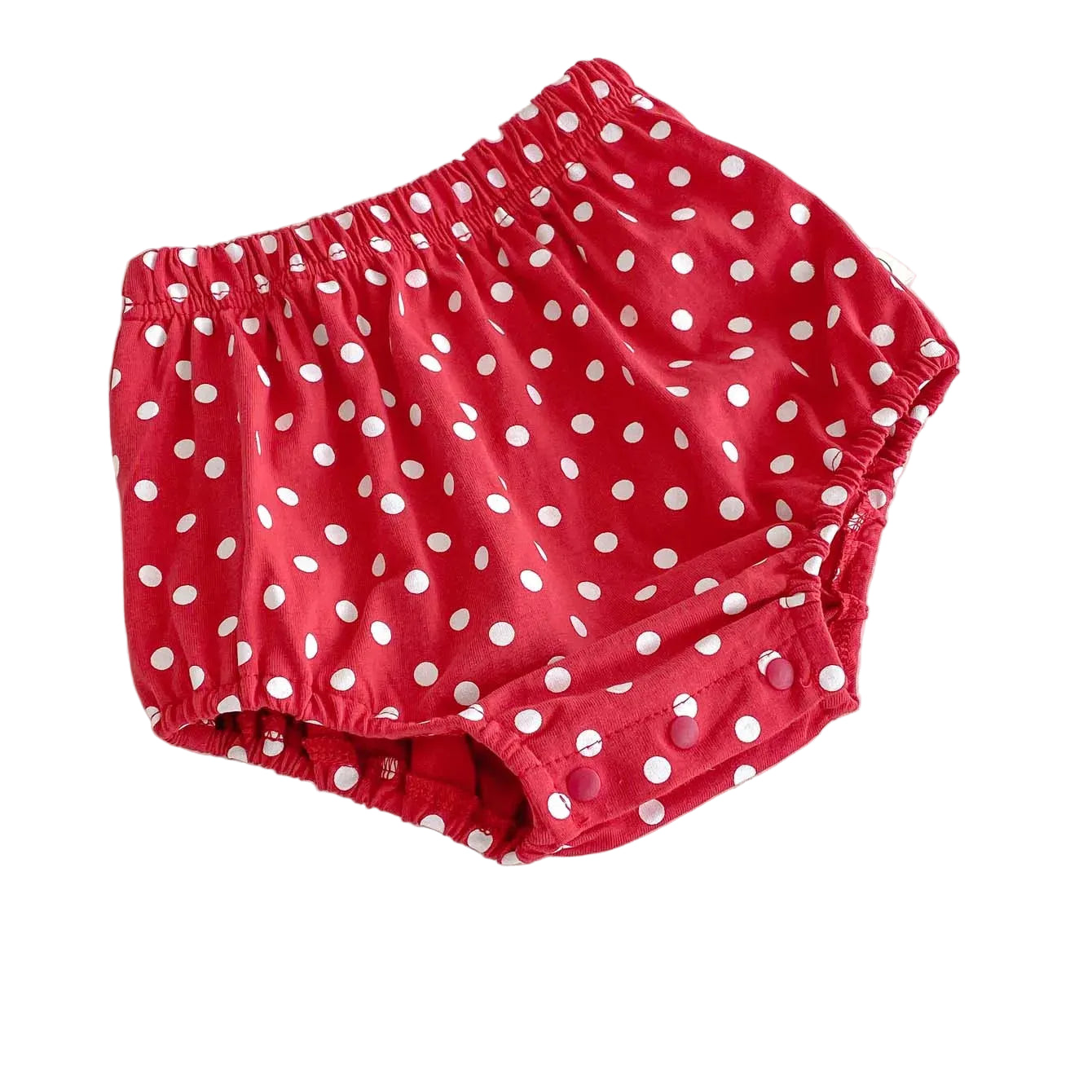 Classic red infant bloomers with white polka dots and elastic waistband for a comfortable fit.