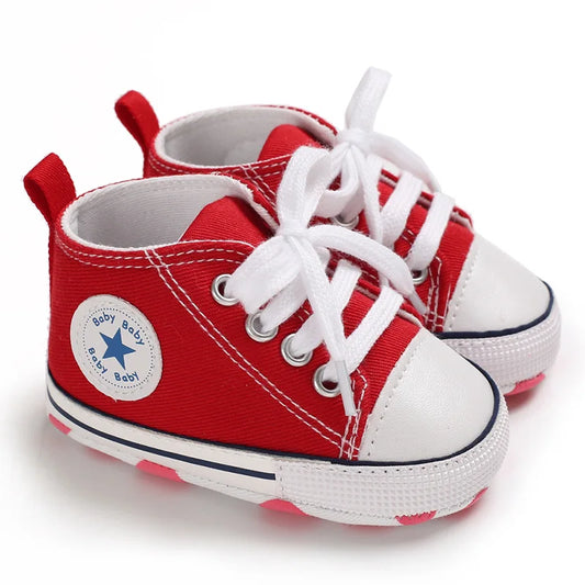 Red classic high-top canvas sneaker for infant first walkers with non-slip sole.