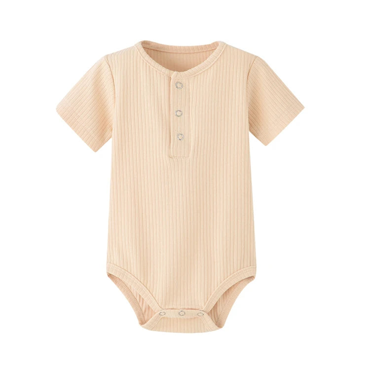 Oatmeal cream ribbed short sleeve baby boy romper with three-button henley neckline.