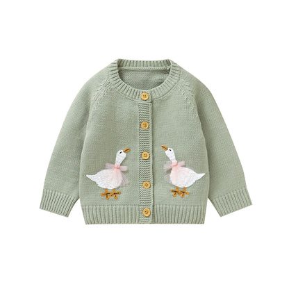 Sage green baby and toddler girls knit cardigan sweater featuring two embroidered geese, flat lay on a white background.