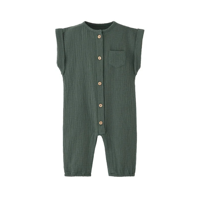 Front view of the vintage-inspired infant jumpsuit in an earthy sage green, featuring a rolled cap sleeve and rustic buttons.