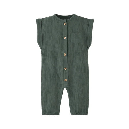 Front view of the vintage-inspired infant jumpsuit in an earthy sage green, featuring a rolled cap sleeve and rustic buttons.