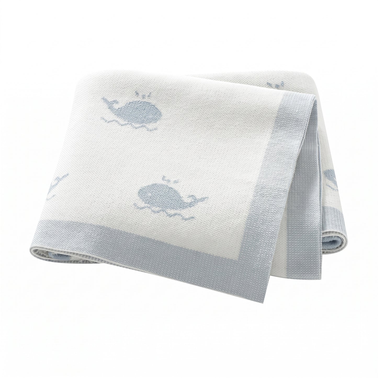 Kidsely soft knit baby blanket in white with blue whale pattern for nursery decor