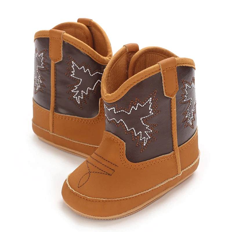 Pair of tan and brown two-tone baby cowboy boots.
