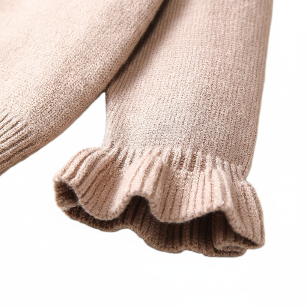 Detailed close-up showing the soft viscose knit texture of the statement ruffle collar.