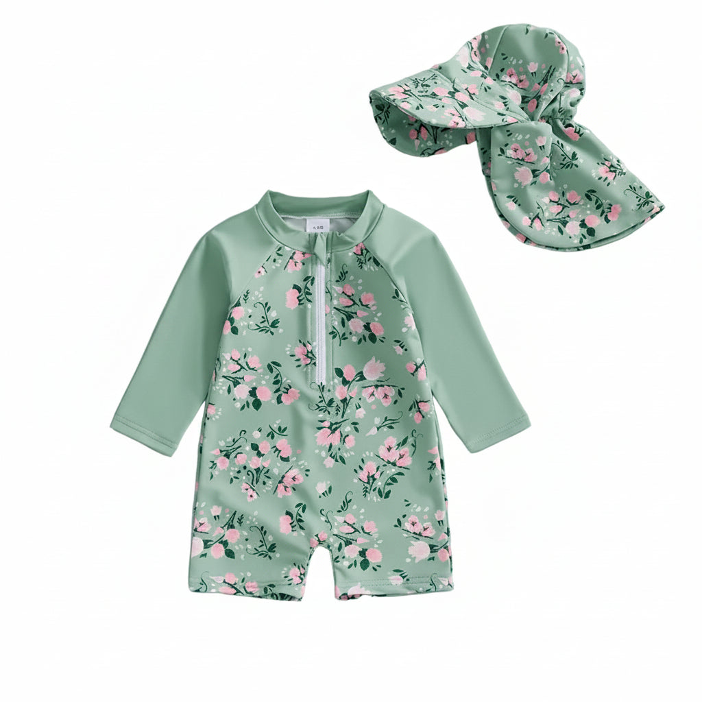 Sage green toddler and baby girl long sleeve one-piece rash guard swimsuit featuring a pink vintage rose cottagecore print and matching sun hat set on a white background.