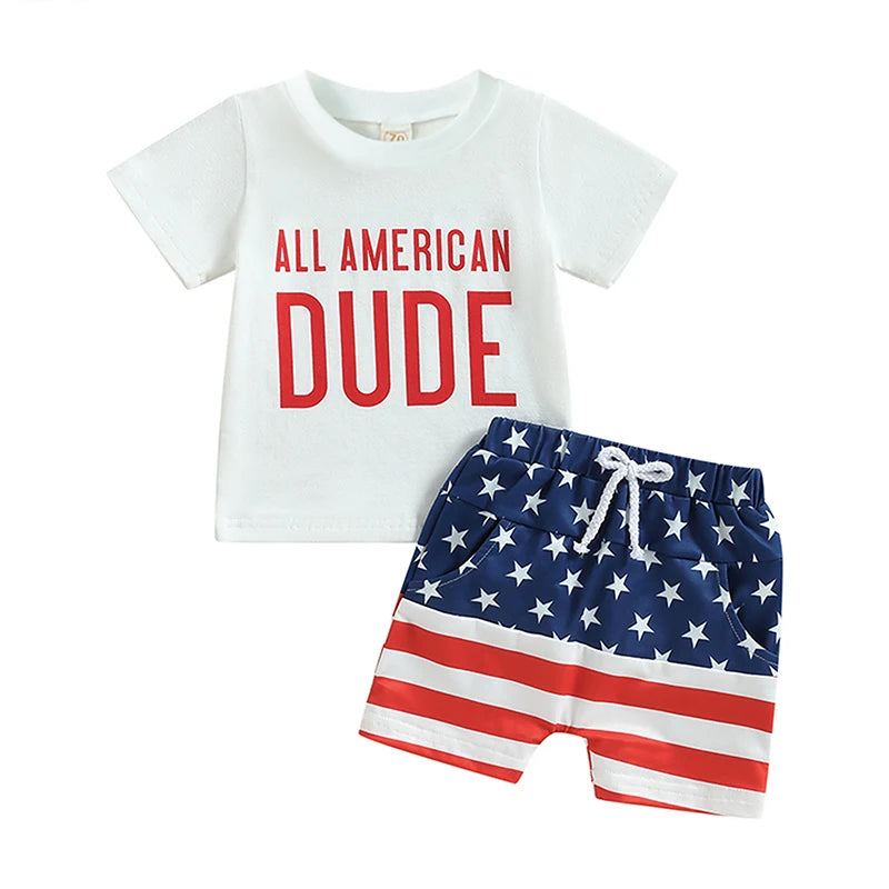 Toddler boy 4th of July outfit featuring a white "All American Dude" graphic t-shirt and American flag shorts set.