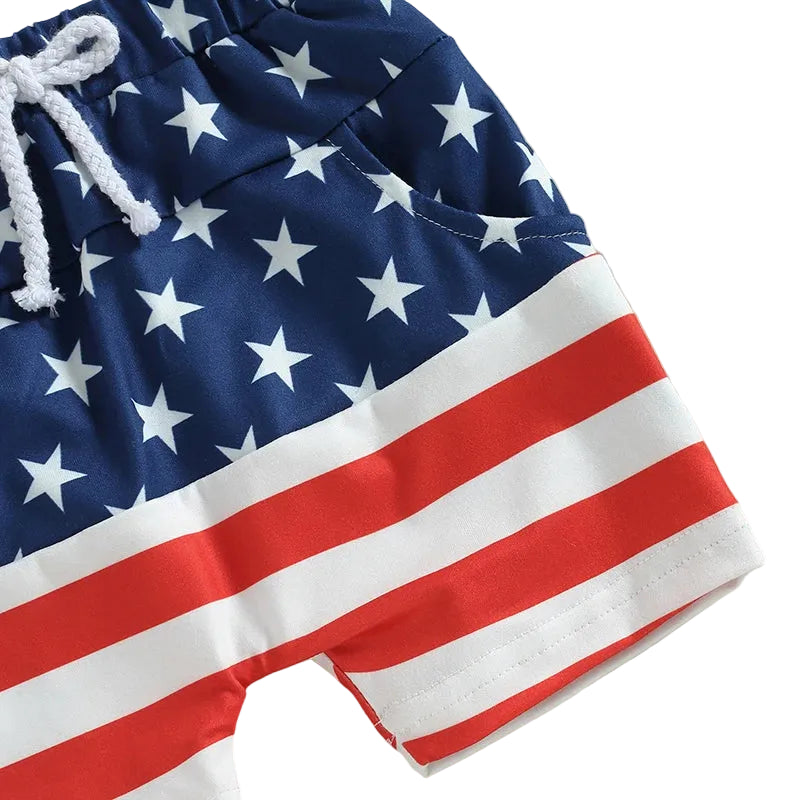 Close-up of the toddler boys' patriotic summer shorts featuring a blue and white star pattern with red and white stripes.