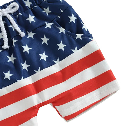 Close-up of the toddler boys' patriotic summer shorts featuring a blue and white star pattern with red and white stripes.