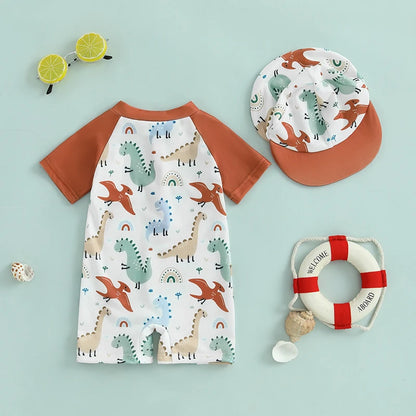 Back view of the toddler boy dinosaur print swimsuit showing the full pattern coverage and high-quality stitching on the terracotta raglan sleeves.