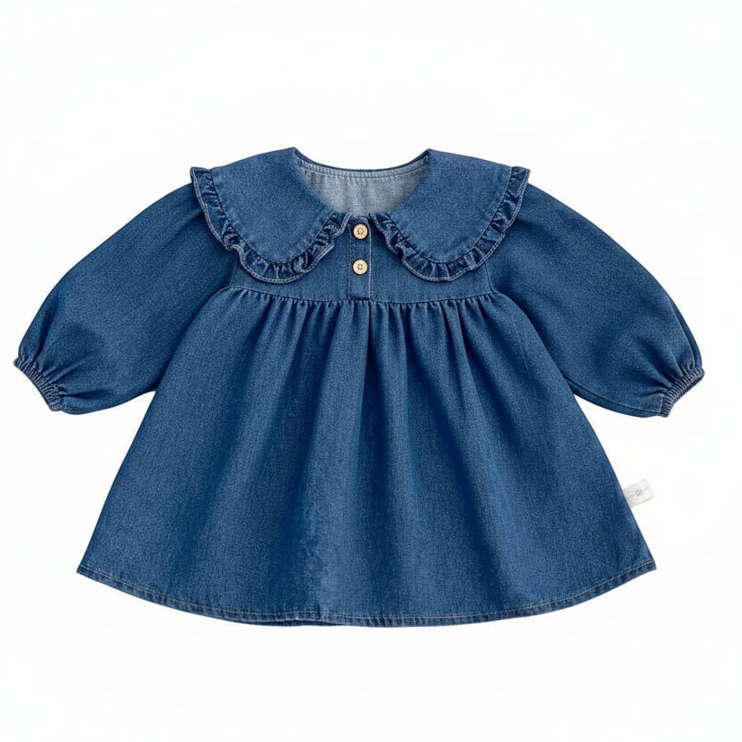 Toddler girl blue denim dress with long sleeves and a ruffle Peter Pan collar displayed flat on a white background.