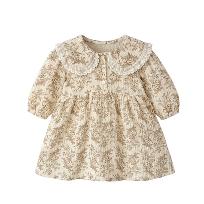 Toddler girl vintage cottagecore floral long sleeve dress with lace Peter Pan collar flat lay on white background.