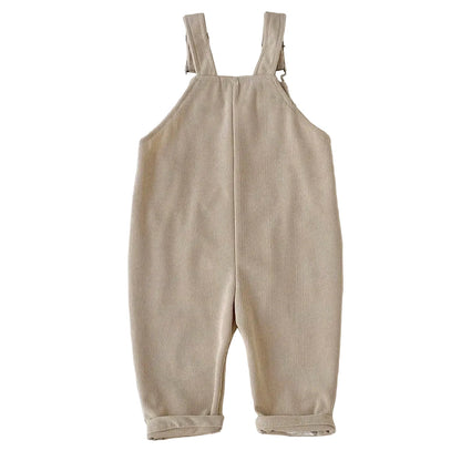 Back view of the baby and toddler girls corduroy overalls in a solid Oatmeal Beige color.