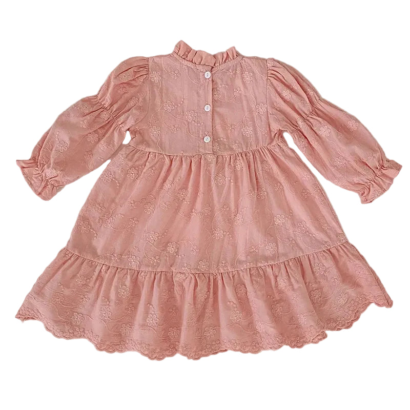 Back view flat lay of a toddler and girls pink floral embroidered tiered dress showing back button details.