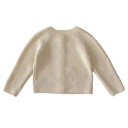 Clean back view of the plain cream-colored 100% cotton knit toddler cardigan sweater on a white background.