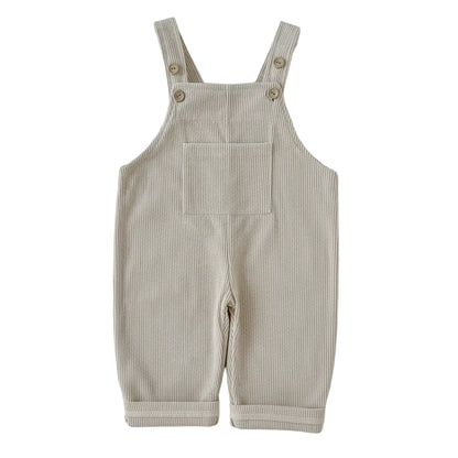 Front view of Kidsely neutral beige corduroy overalls for babies and toddlers, featuring a square neckline and front pocket.