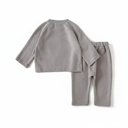 Back view flat lay of the plain grey knit baby pullover sweater and matching pants.