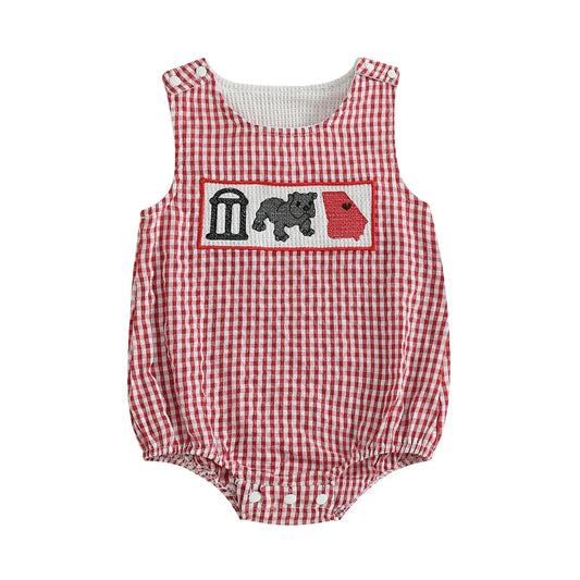 Front view of a red and white seersucker gingham baby bubble romper featuring a hand-smocked chest plate with a historic southern archway, grey bulldog, and red Georgia state map with a small heart on a solid white background.