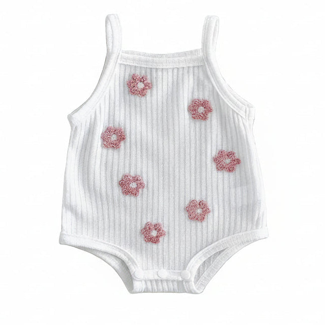 White ribbed sleeveless baby girl romper featuring pink 3D floral towel embroidery on a clean white background.
